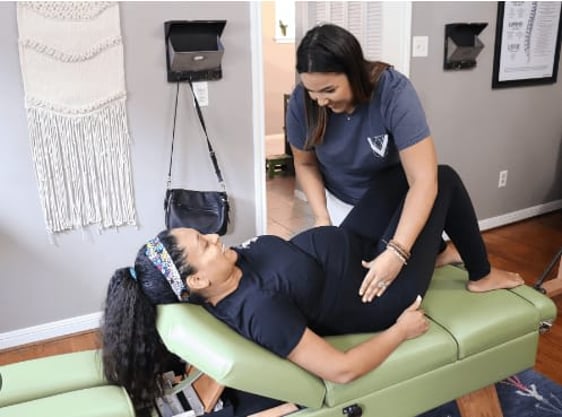 Photo of pregnant woman with chiropractor