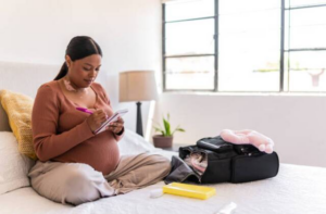 A pregnant woman with checklist