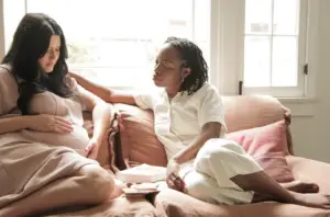 A doula helping a soon-to-be-mom
